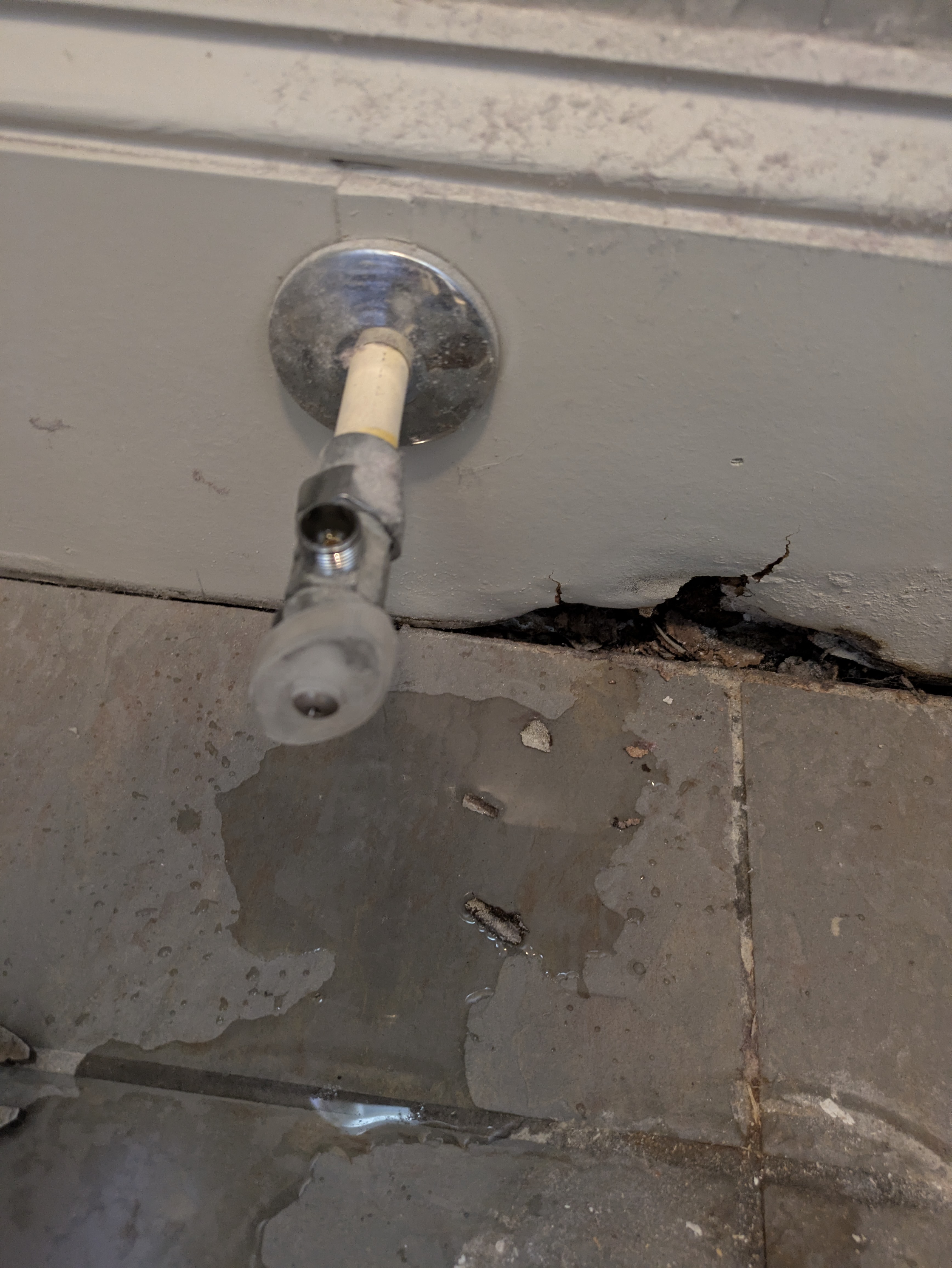 Installing new hot and cold water supply lines for a vanity